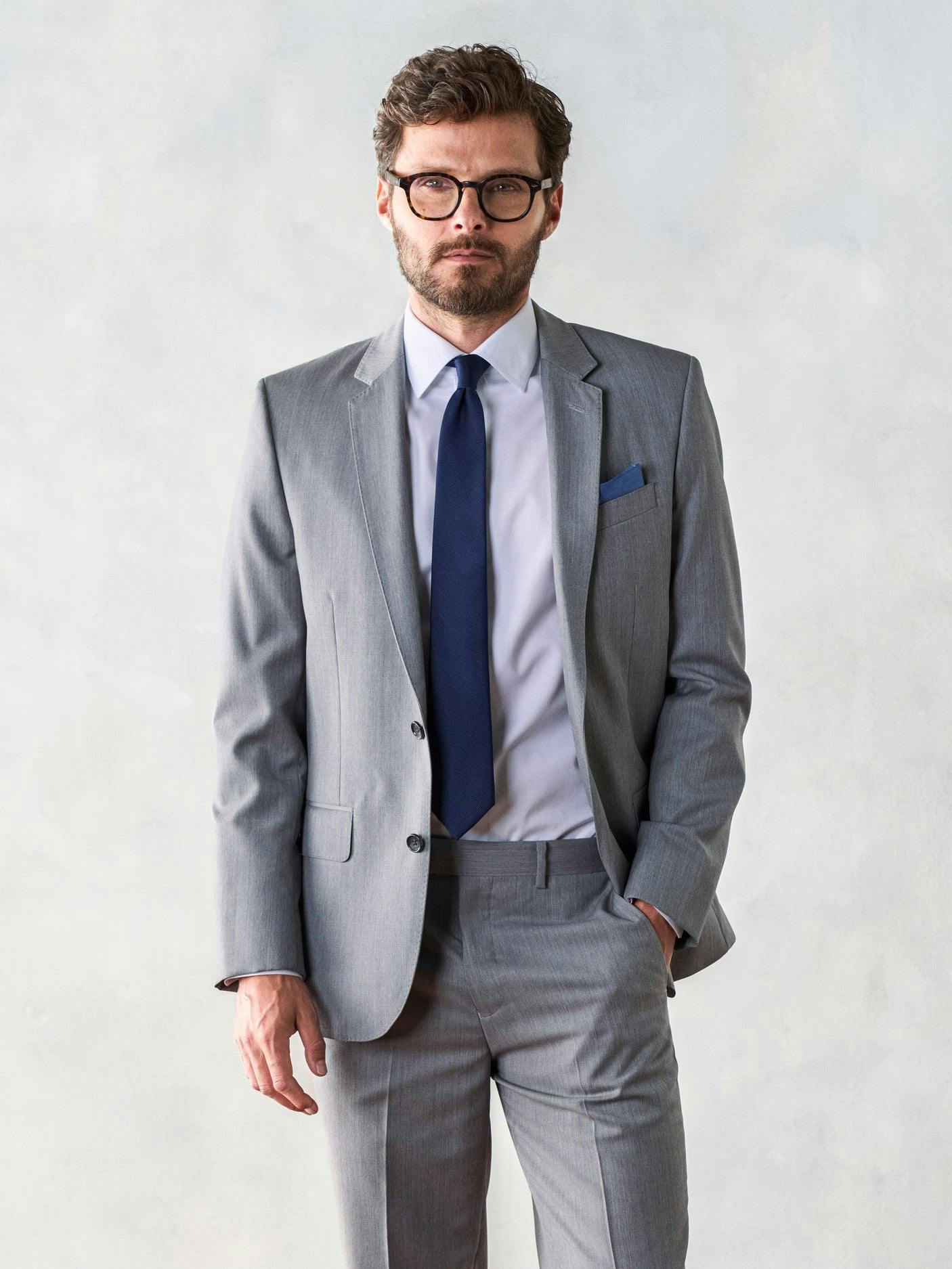 Like a cloud passing in front of the afternoon sun, this light grey suit provides the perfect shade to get you through any event in style. Includes jacket and pants. Pants are available in classic and slim fits.