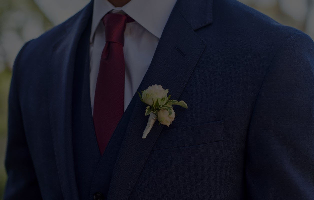 Suit with a boutonniere
