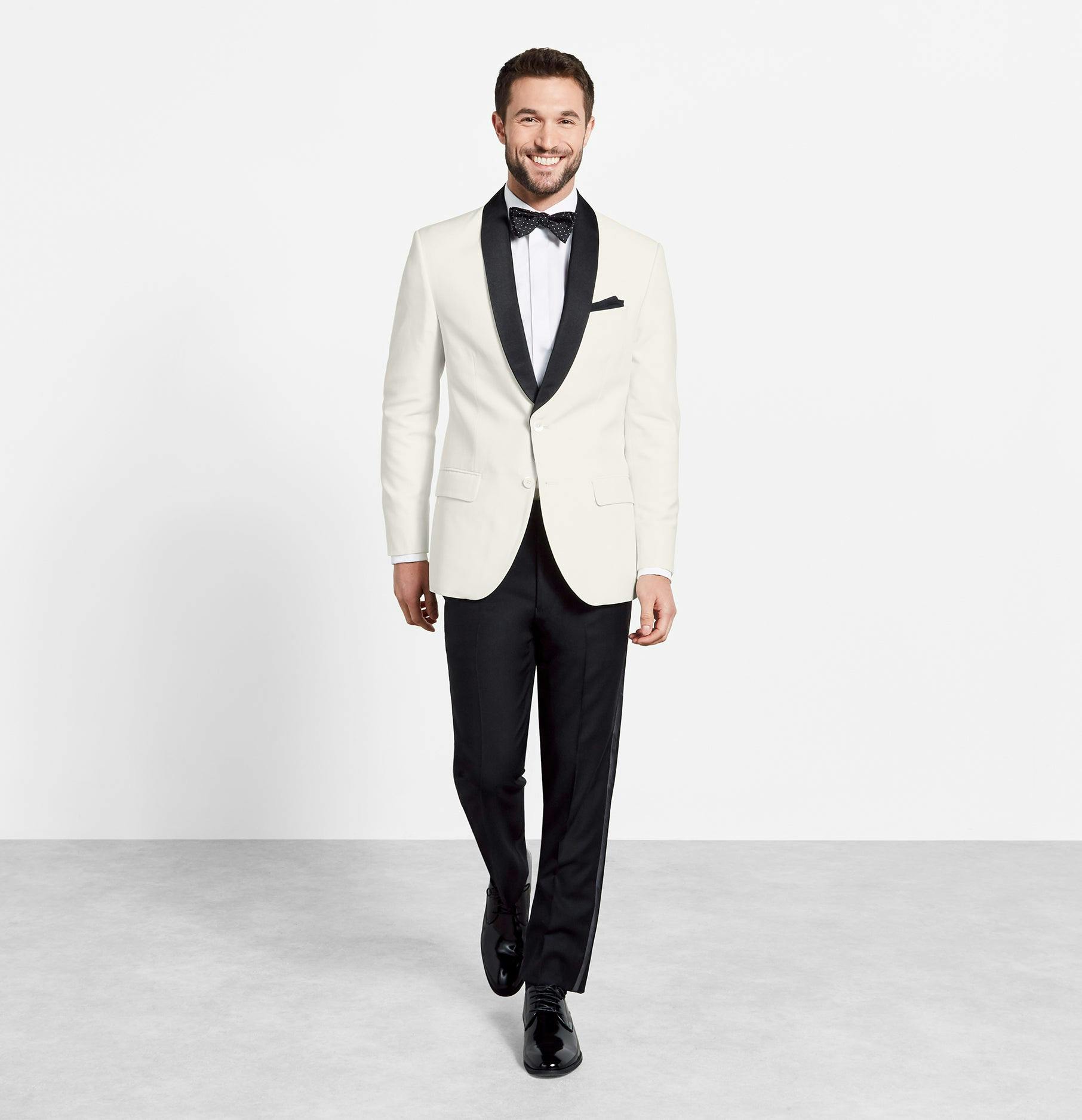 The white dinner jacket with black lapels is a classic look. Originally a warm weather alternative to the black tuxedo, these days a contrast shawl tux keeps its cool in any climate. Includes jacket and pants. Pants are available in classic and slim fits.