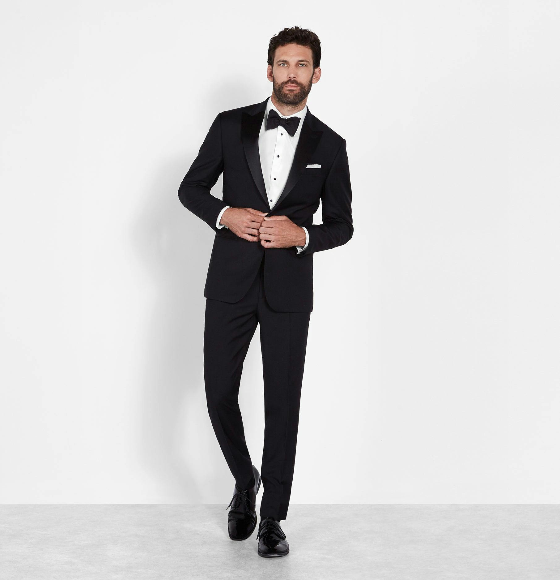 This is peak formalwear style, literally. It's tough to beat the classic yet statement-making look of a peak lapel tuxedo plus, the upward-pointing lapels frame your face and elongate your frame. Win, win.

Includes jacket and pants. Pants are available in classic and slim fits.