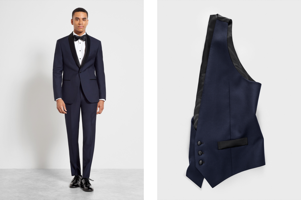 Midnight blue shawl collar tuxedo with vest.