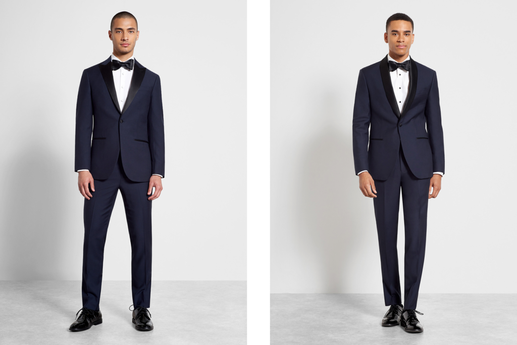 Two men in midnight blue groom tuxedos.