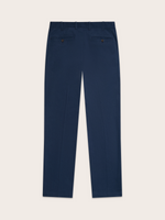 Navy chino pants laid flat, back view, welt pockets with button visible