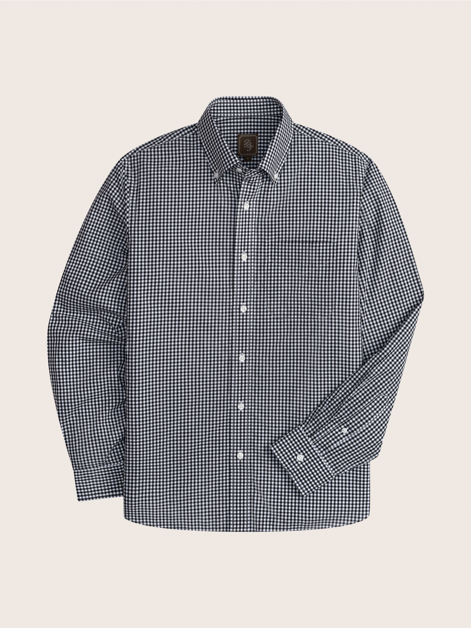 Black and white checkered button-up shirt with long sleeves.
