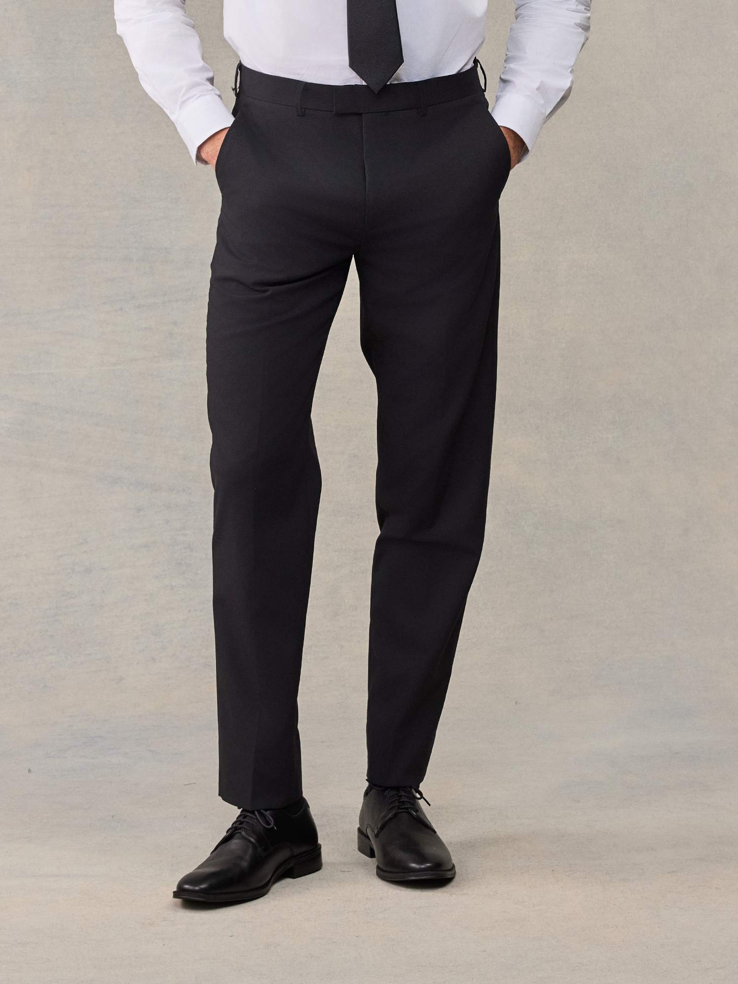 The Black Tux Essential Suit Pants-Classic In Black | Size: 34/30 | Polyester/Elastane/Wool/Marino Wool The Black Tux Essential Suit Pants-Classic In Black | Size: 34/30 | Polyester/Elastane/Wool/Marino Wool
