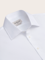 White dress shirt with a collar and buttons, labeled 'The Black Tux'.