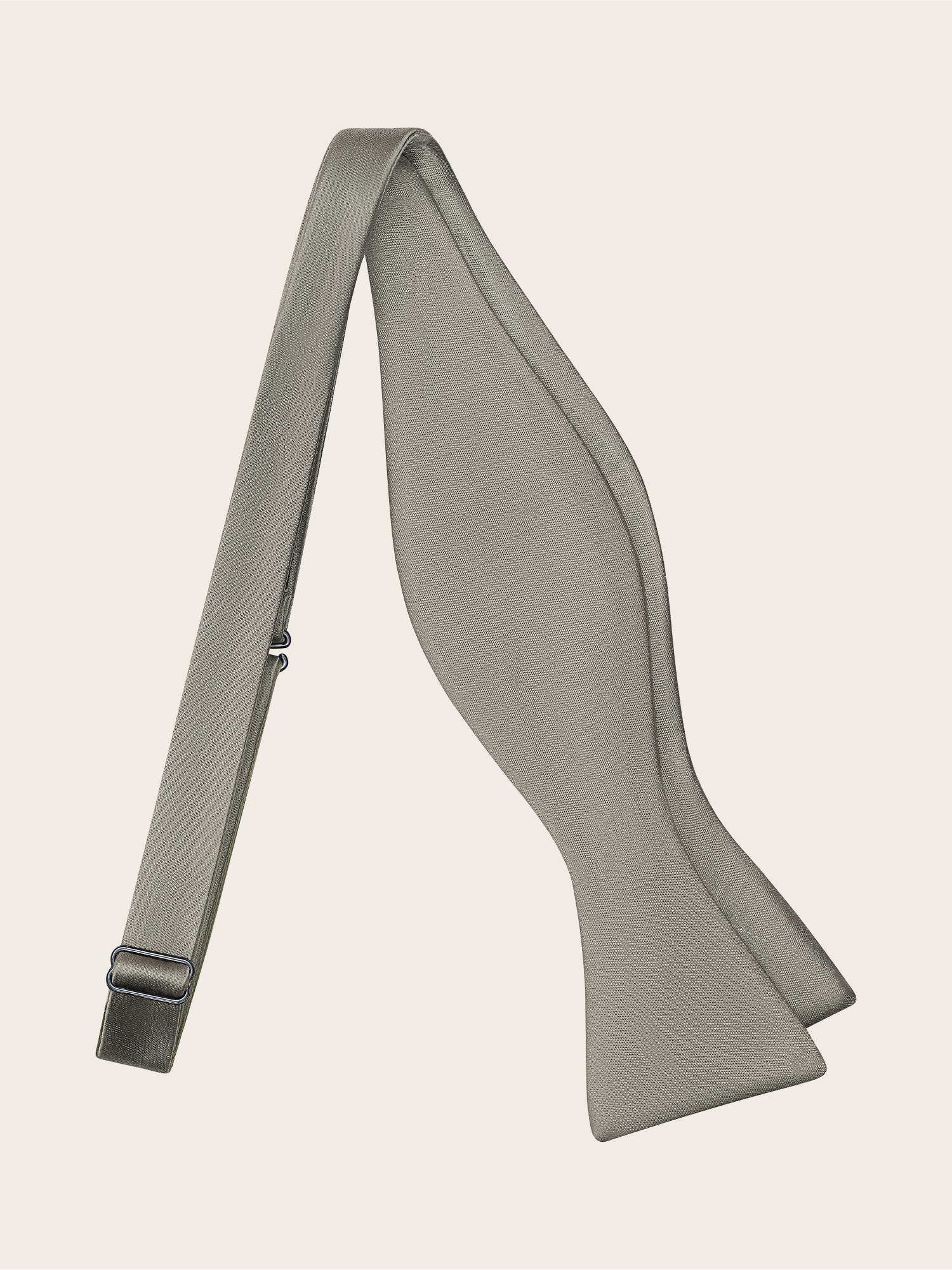 A grey bow tie with a smooth texture and a strap.