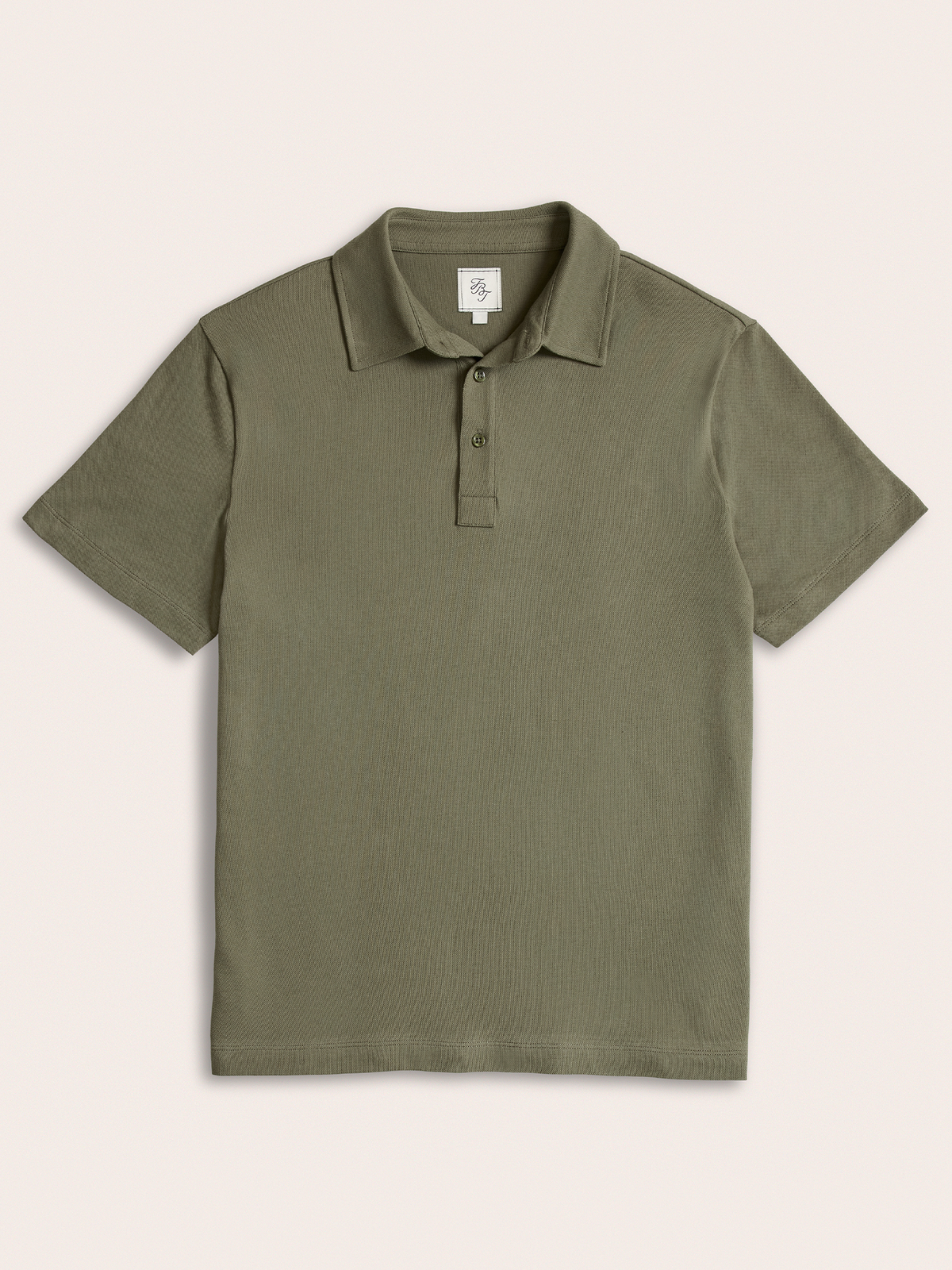 Olive green pique polo shirt laid flat, front view, on cream background