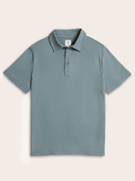 Light blue polo shirt flat lay, front view with two-button placket