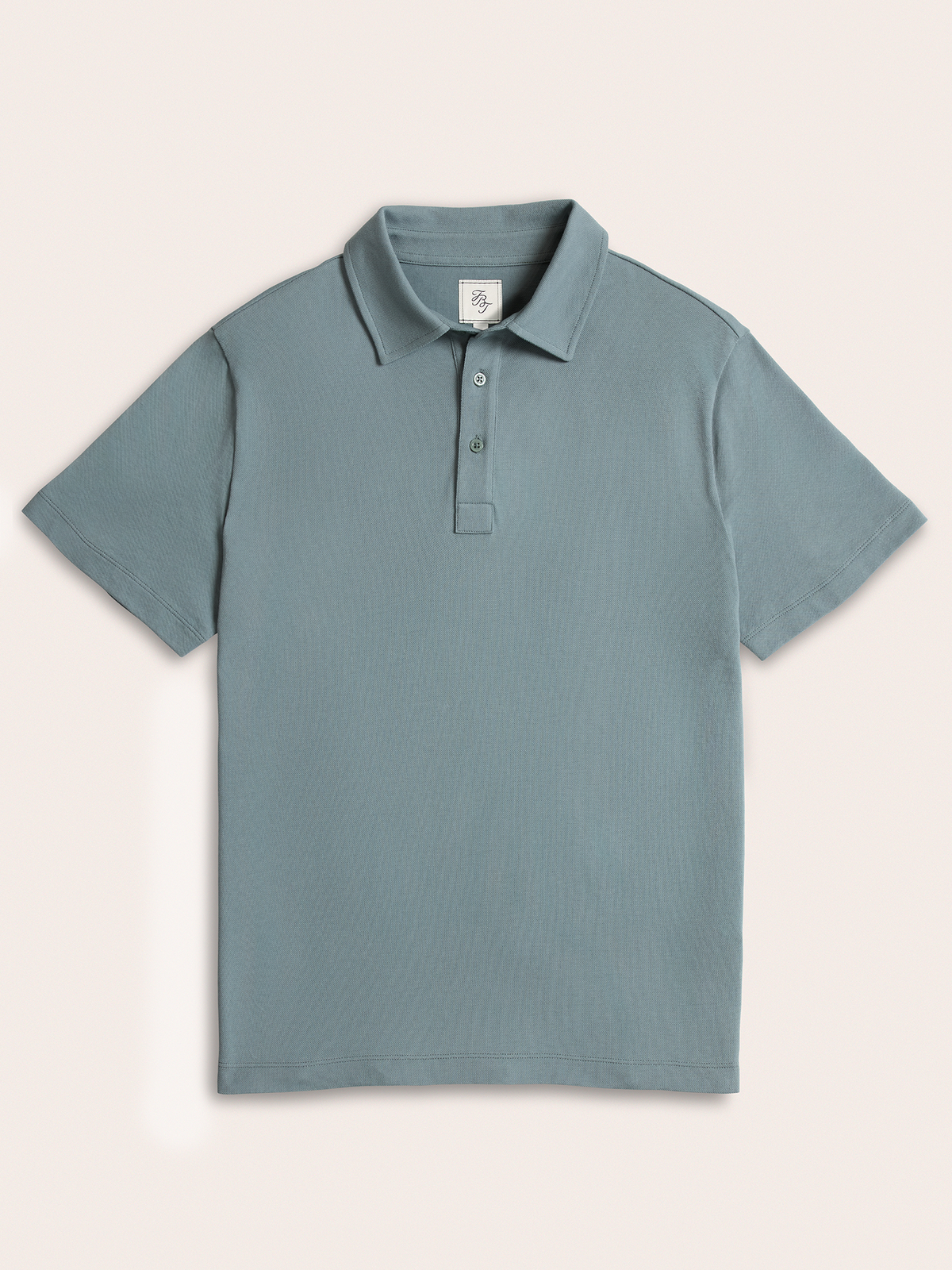 Light blue polo shirt flat lay, front view with two-button placket