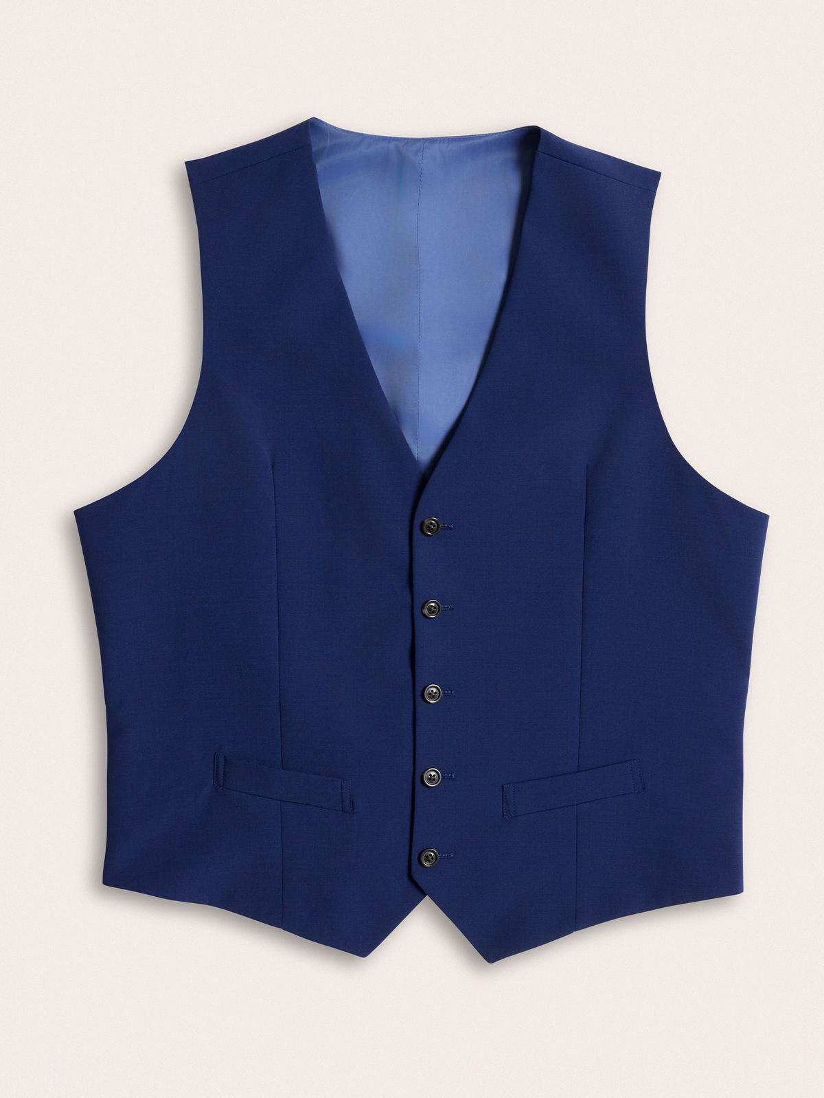 Cove blue suit vest laid flat, five-button front with welt pockets and light blue lining, cream background.