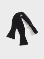 Black velvet bow tie with adjustable strap.