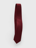 Burgundy tie displayed against a plain white background.