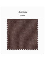 Chocolate silk fabric swatch with a textured pattern.