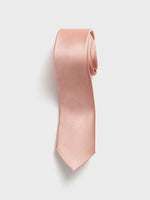 A light pink tie with a subtle striped pattern, hanging against a white background.