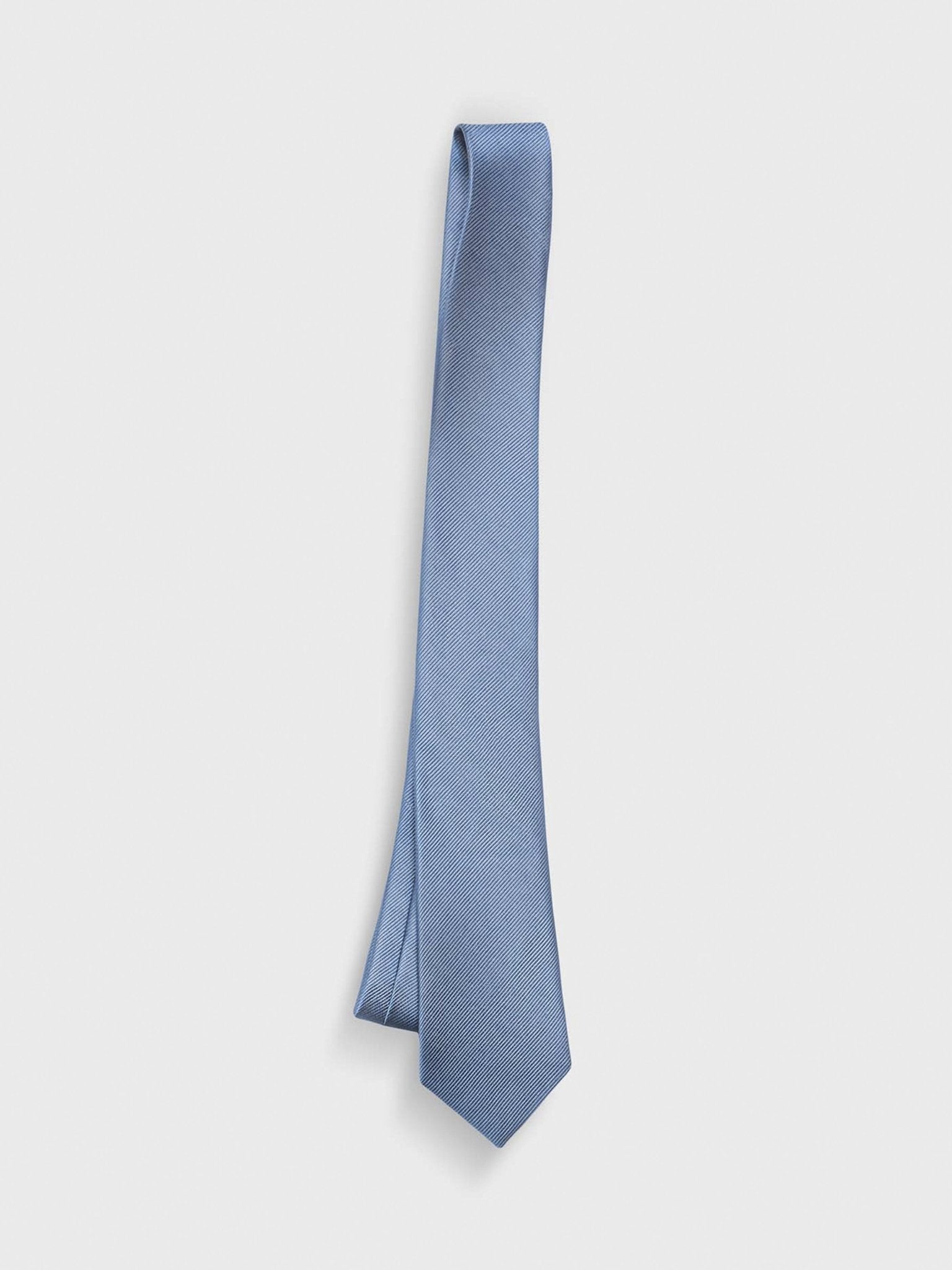 Light blue tie with a textured pattern, hanging against a white background.