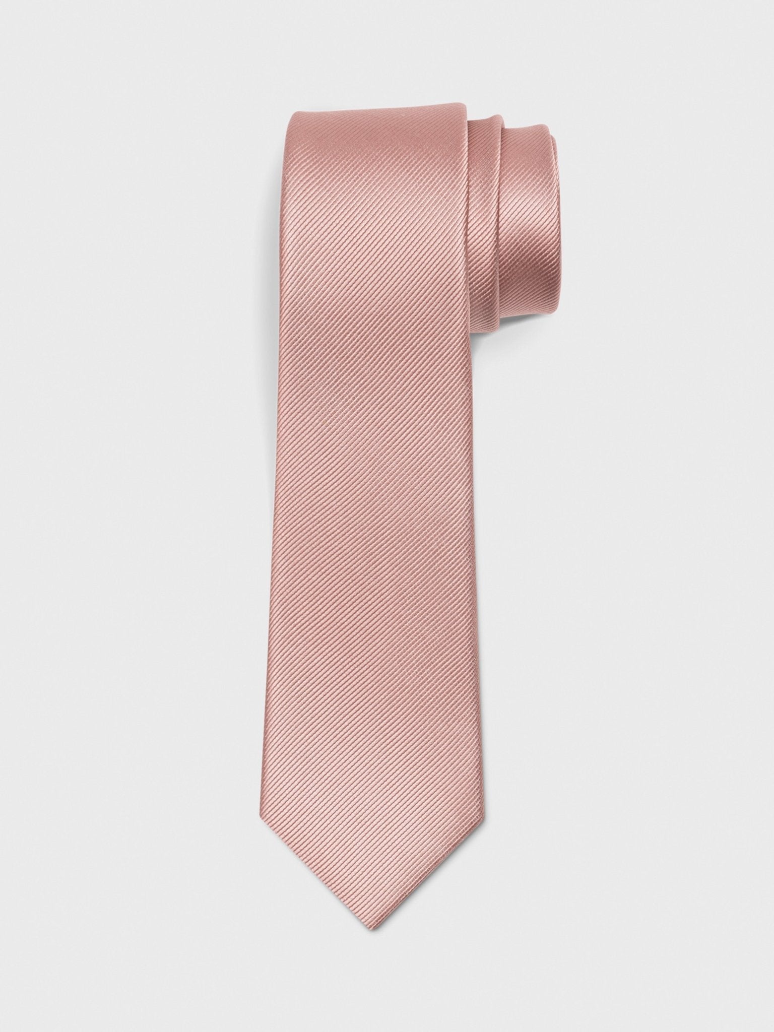 Light pink tie with a textured pattern, rolled at the top.