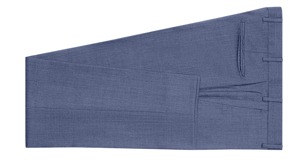 Blue dress pants laid flat on a green background.