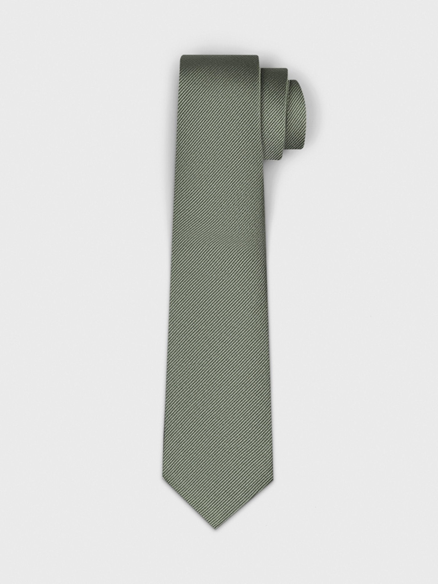 A rolled green tie with a textured pattern.