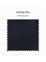 Swatch of midnight blue fabric labeled 100% Merino Wool.