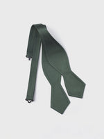 Dark green bow tie with a textured pattern, laid flat on a white background.
