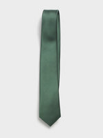 Solid green tie with a textured pattern, hanging vertically.