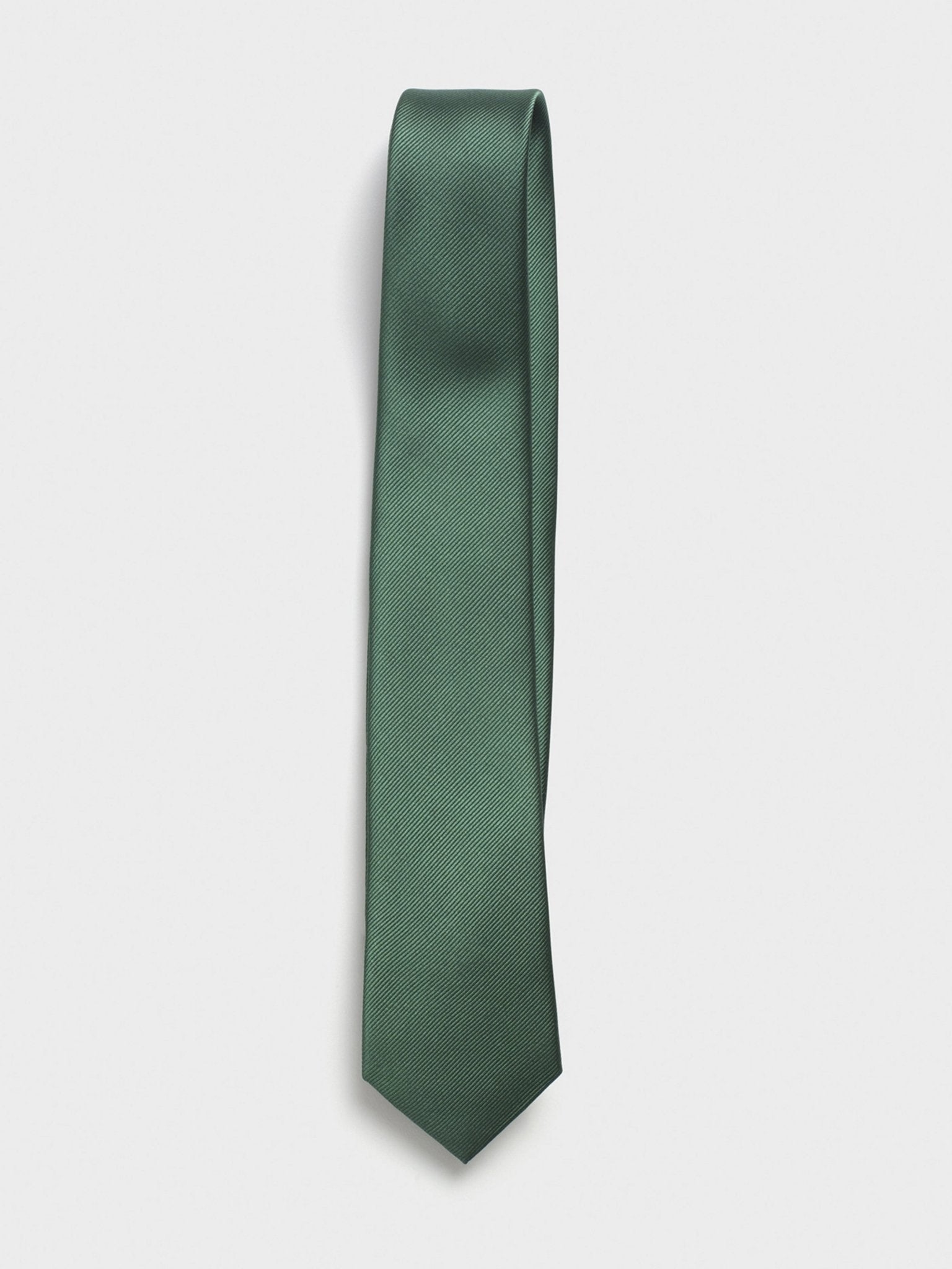 Solid green tie with a textured pattern, hanging vertically.