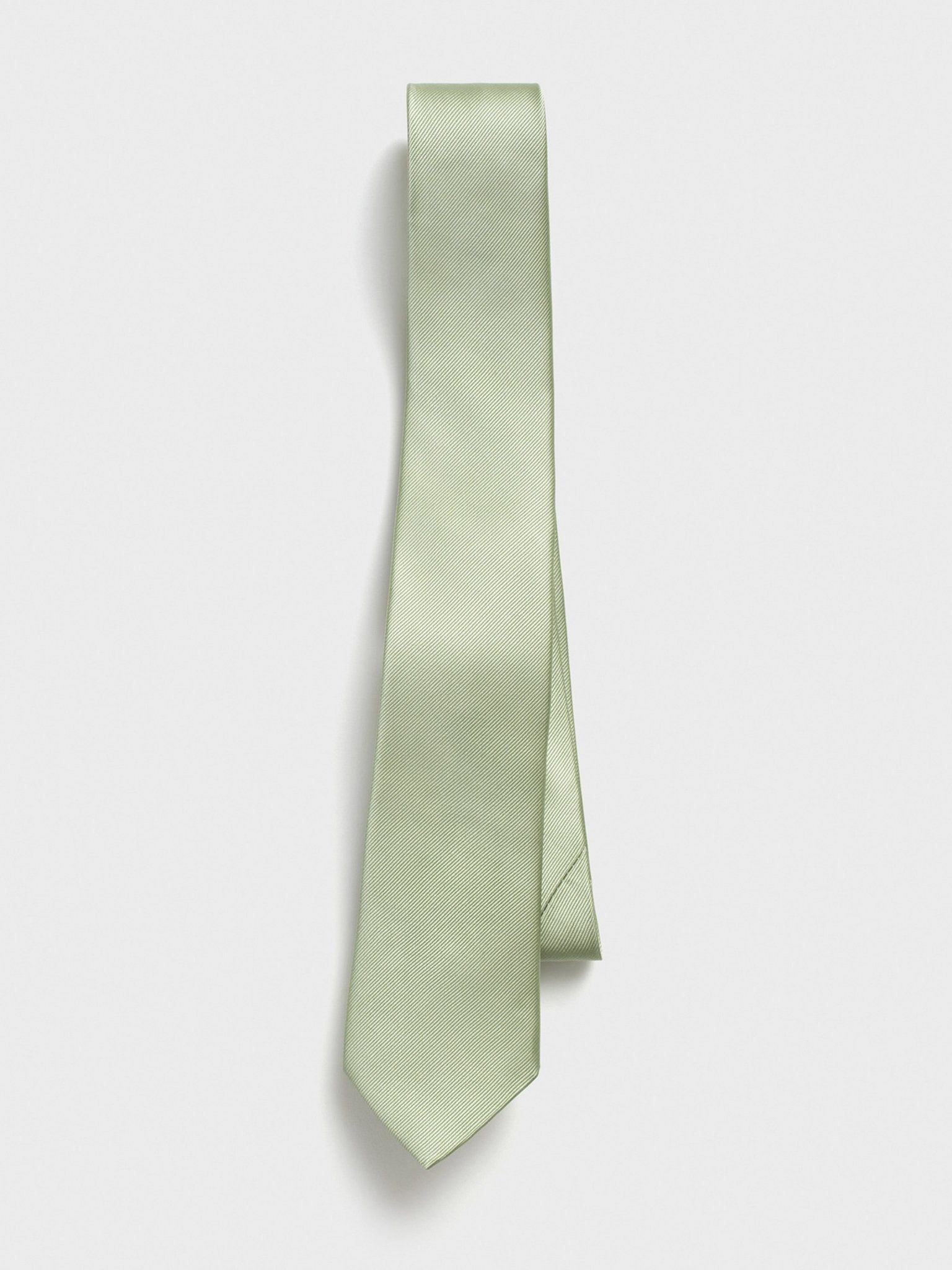 Light green tie displayed against a white background.