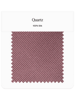 Fabric swatch labeled 'Quartz' in a light mauve color, 100% silk.