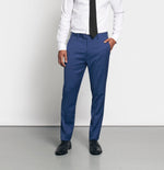 Man wearing a white shirt, black tie, and blue dress pants.