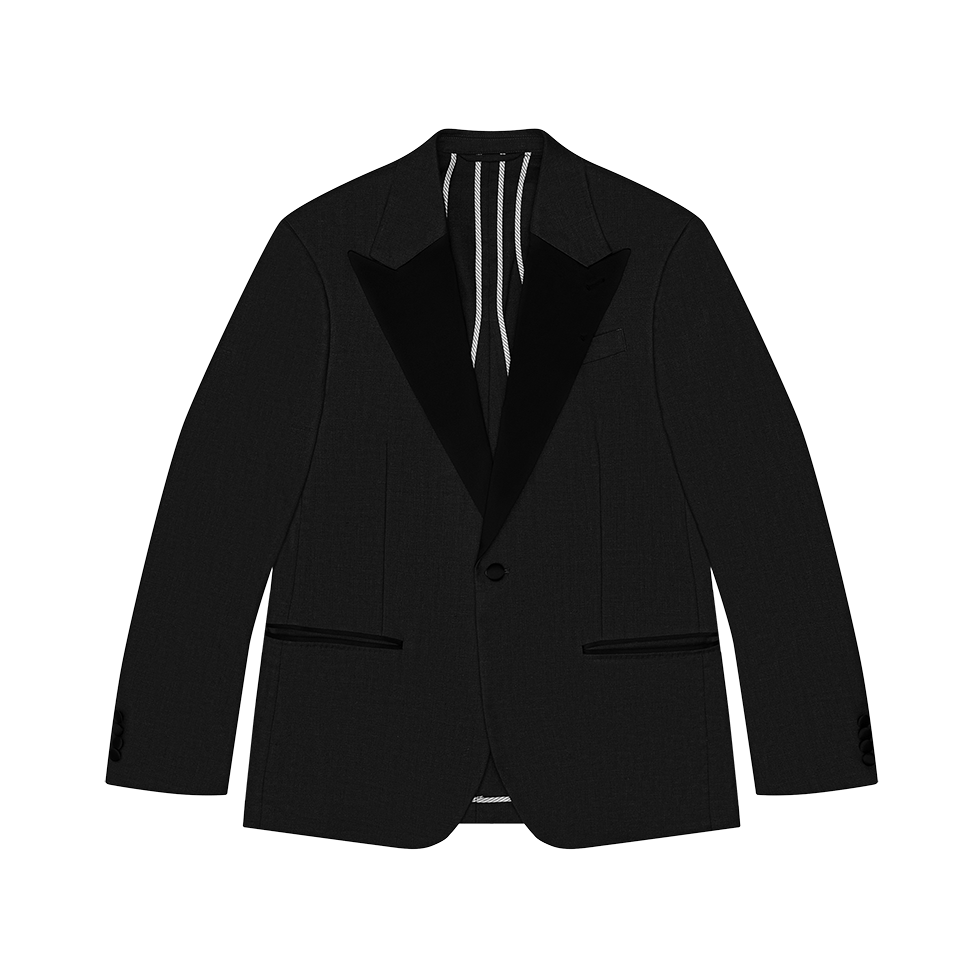 Black tuxedo jacket with satin lapels, displayed flat on a green background.