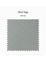 Fabric swatch labeled Silver Sage, 100% Silk with a textured pattern.