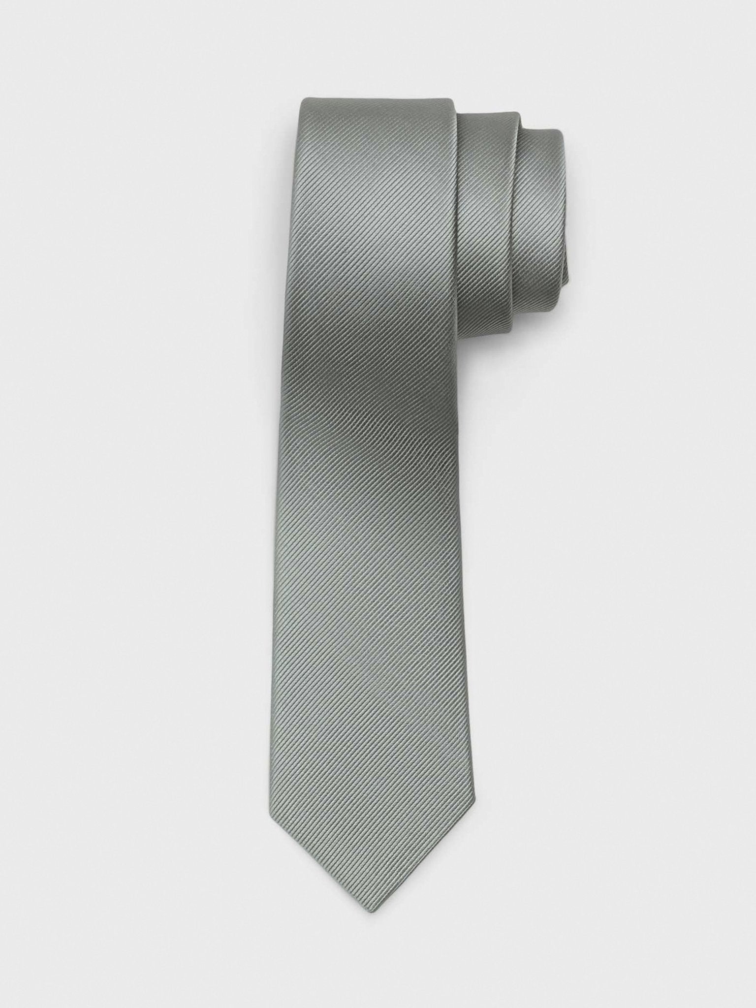 A folded grey tie with a textured pattern.