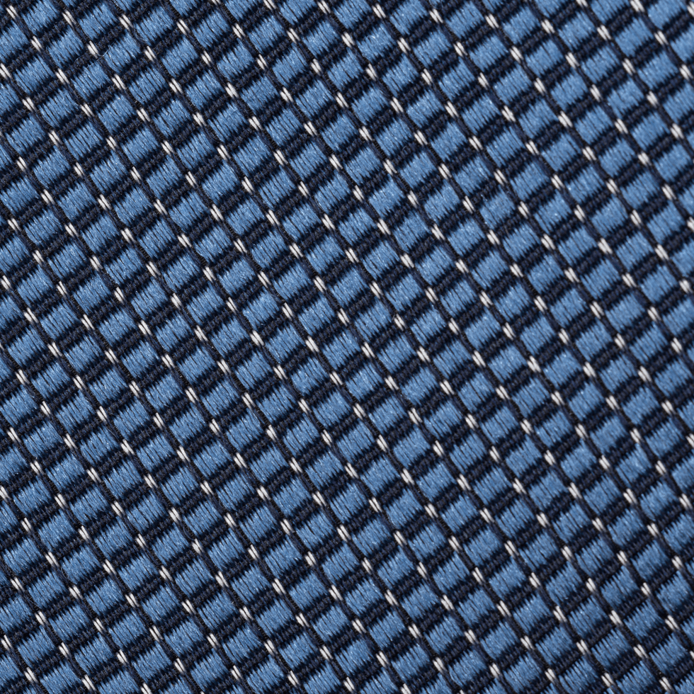 Close-up of a textured fabric in blue and black pattern.