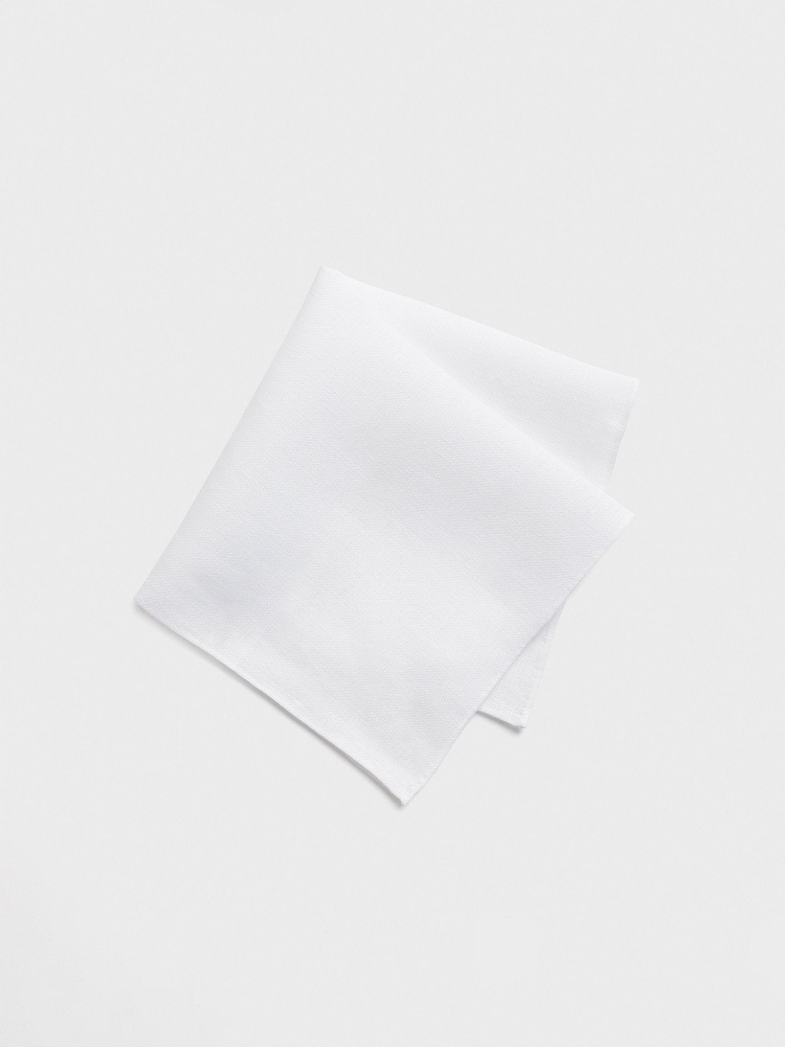 White handkerchief folded on a light background.