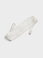A white satin cummerbund with pleats and adjustable straps.